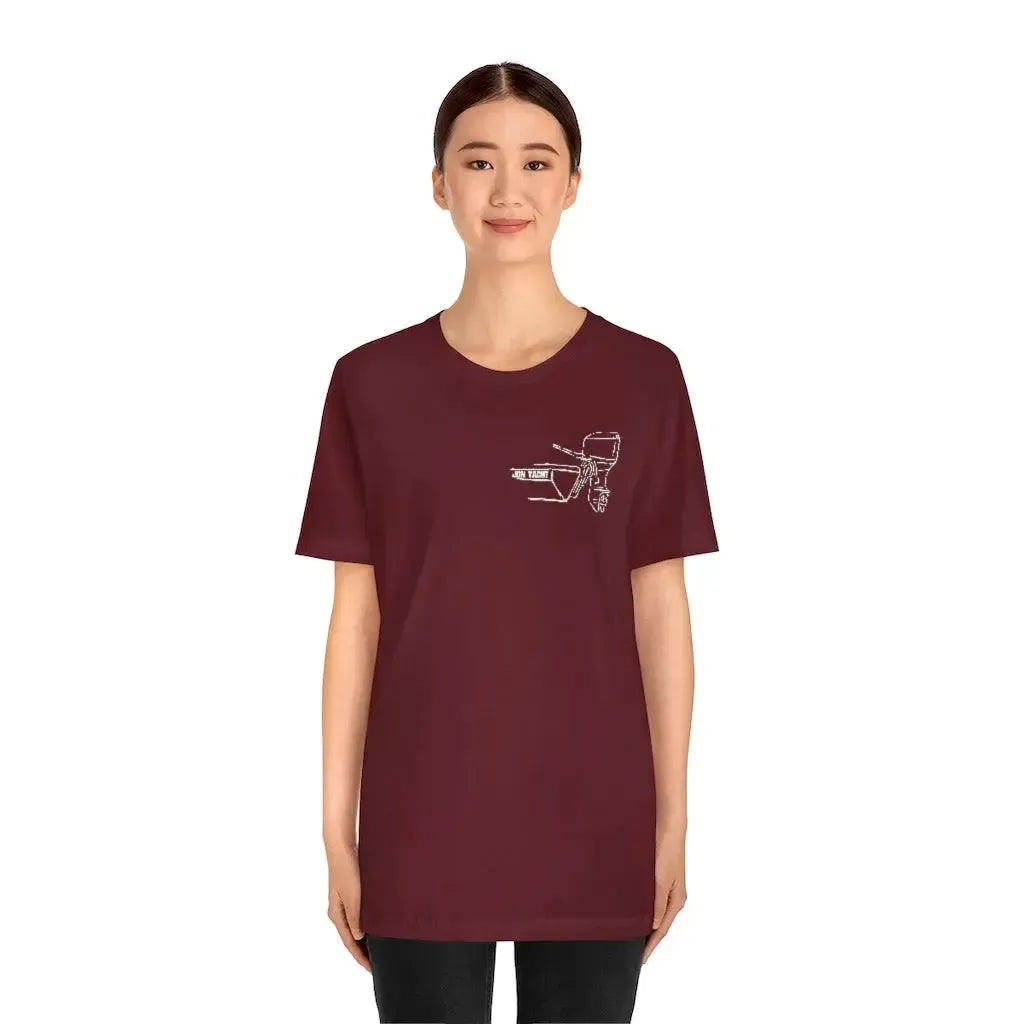 Woman wearing a maroon MERC Tiller graphic tee made from soft Airlume combed and ringspun cotton.
