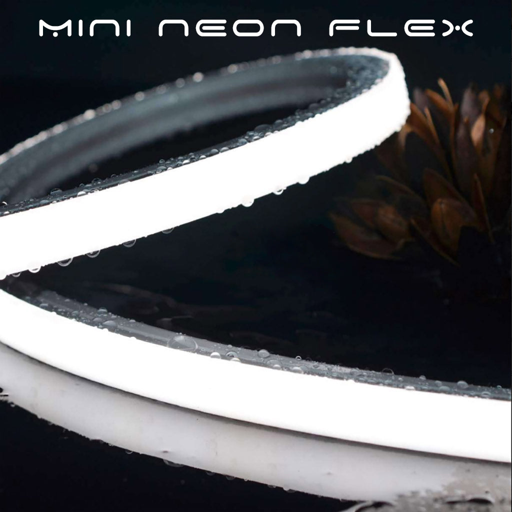 White MINI LED Neon Flex, a flexible, waterproof strip light with visible water droplets.