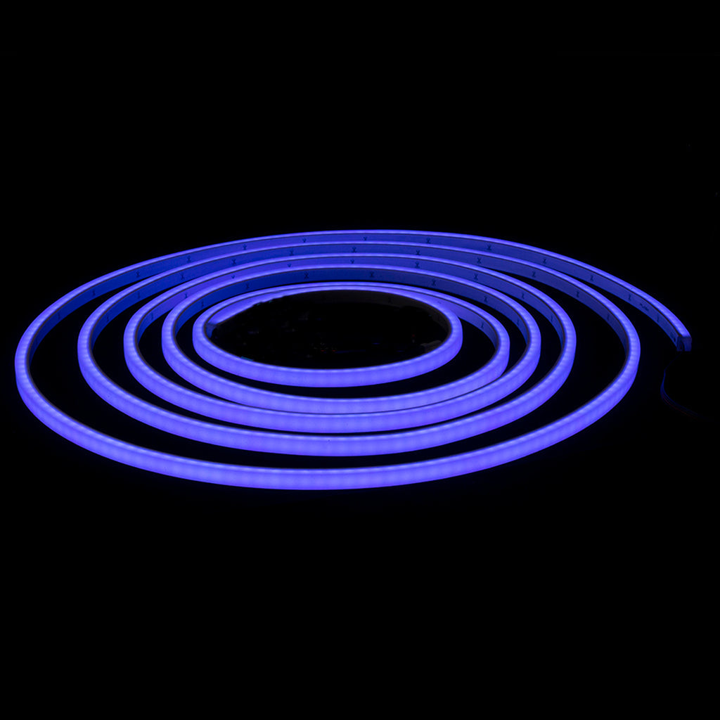 Coiled RGBW Mini LED Neon Flex glowing purple against a dark background, showcasing its flexible, dot-free design.