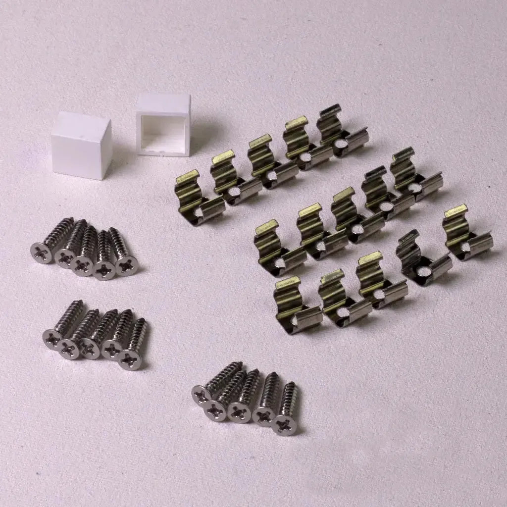 White end caps, silver mounting clips, and screws for MINI LED Neon Flex installation.
