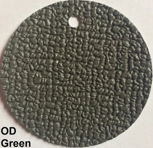 Round OD Green MariDeck marine vinyl flooring sample with a textured, slip-resistant surface.