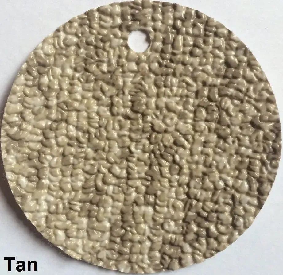 Close-up of a round sample of Tan MariDeck Marine Vinyl Boat Flooring with a textured, slip-resistant surface.