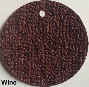 MariDeck Marine Vinyl Boat Flooring swatch in Wine, showing its textured, slip-resistant surface.