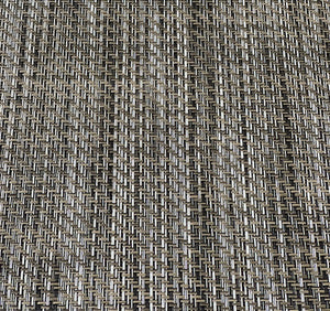 Close-up of MariDeck Ultra Premium vinyl boat flooring with a woven texture in shades of tan and black.