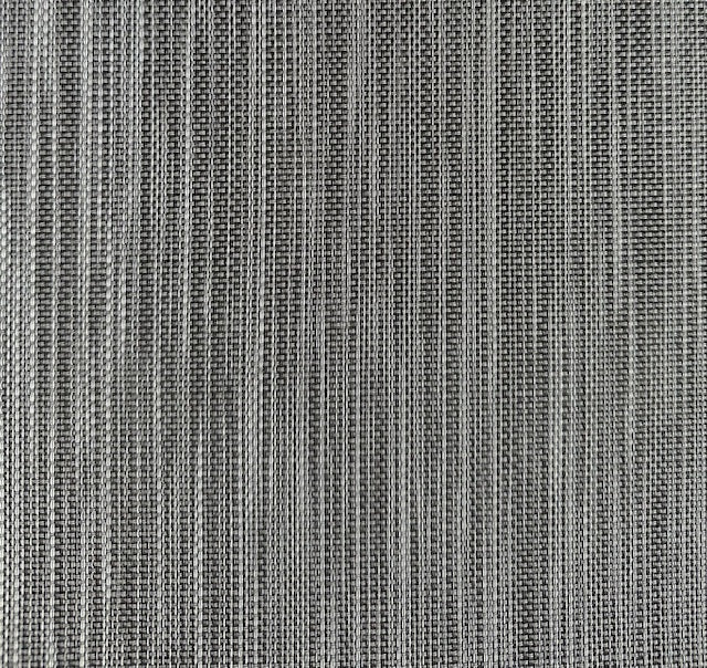 Close-up of MariDeck Ultra Premium vinyl boat flooring with a woven gray texture.
