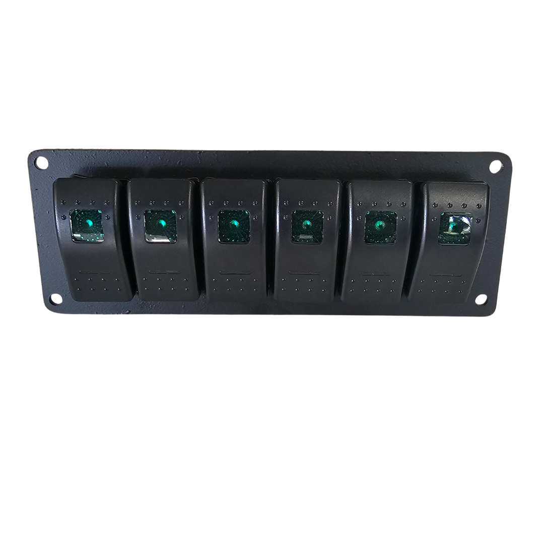 Black solid aluminum mini switch panel with six green lighted rocker switches.