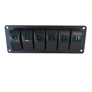 Black solid aluminum mini switch panel with six green lighted rocker switches.