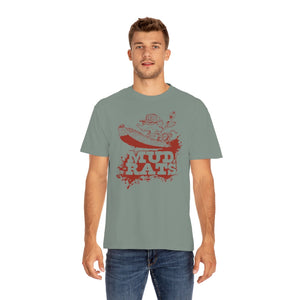 Man wearing a relaxed fit, garment-dyed sage green Mud Rats T-shirt with a red rat driving a boat design.