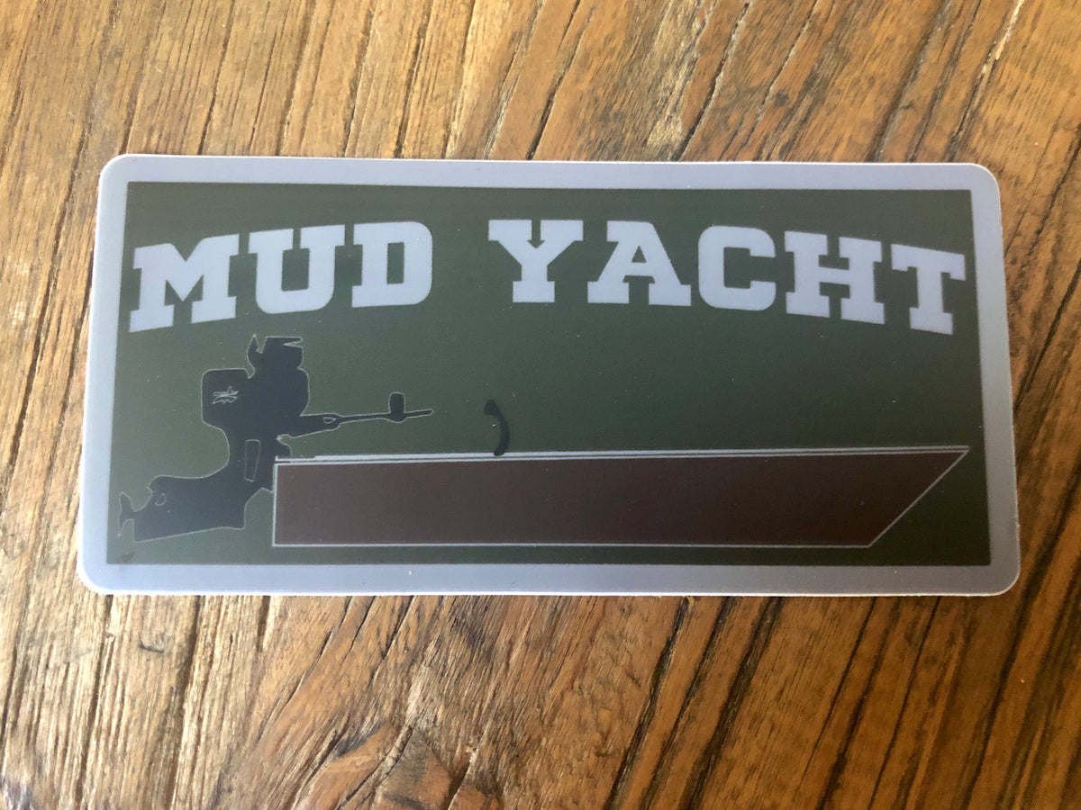 5" Mud Yacht sticker with white text, green background, and a black boat silhouette.