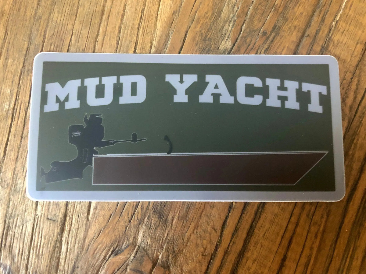 5" Mud Yacht sticker with white text, green background, and a black boat silhouette.