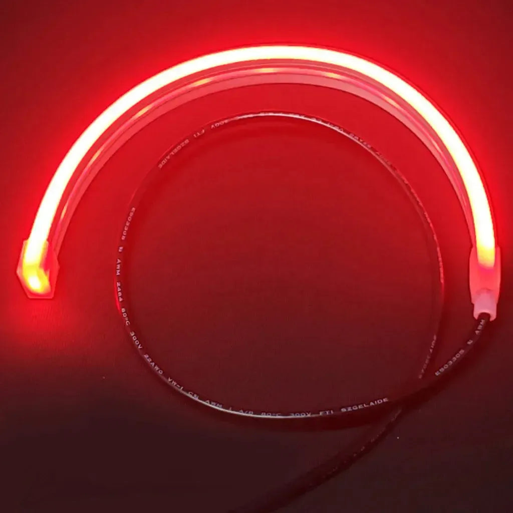 Red illuminated flexible LED neon strip light with black power wire, curved for Mercury 450 outboard cowling.