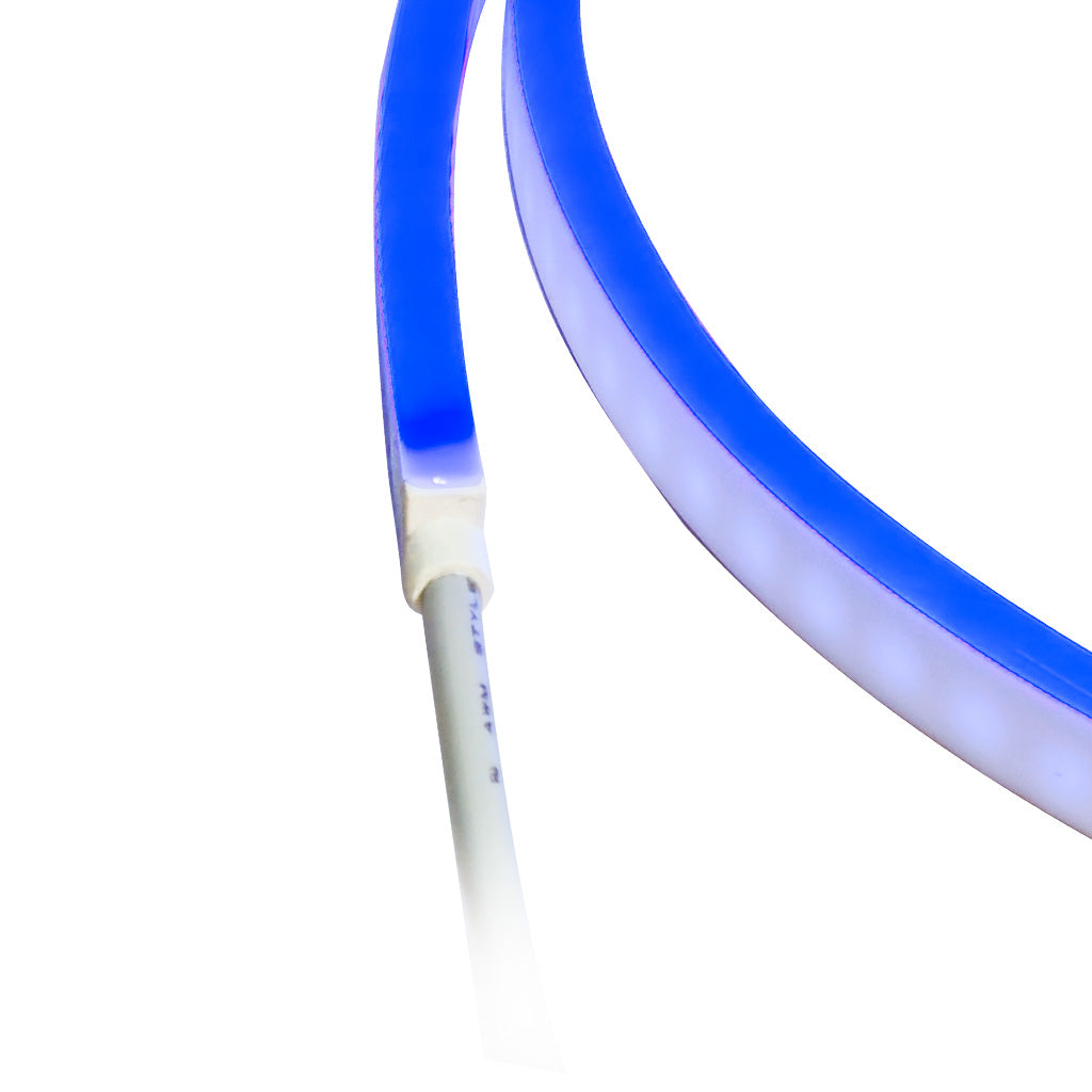 Close-up of ORBIT Neon Flex side-shooting blue LED strip light with white polyurethane coating and power cable.
