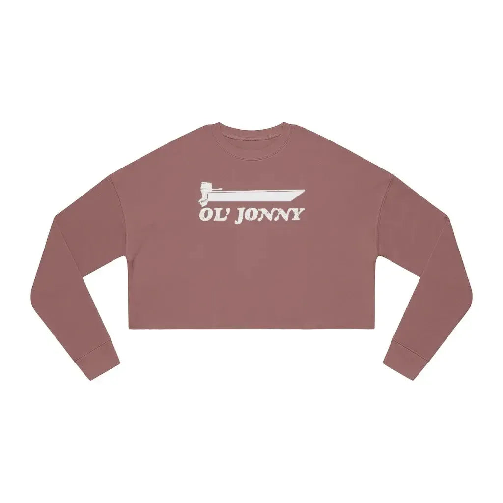 Woman in a brown "Ol' Jonny" cropped sweatshirt with a boat graphic and blue jeans.