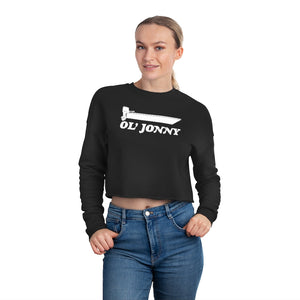 Woman in black Ol' Jonny cropped sweatshirt with boat graphic, relaxed fit, and drop-shoulder seam.