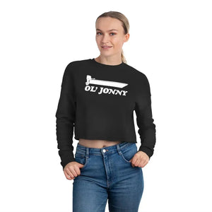 Woman in black Ol' Jonny cropped sweatshirt with boat graphic, relaxed fit, and drop-shoulder seam.