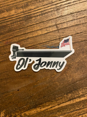 White die-cut Ol' Jonny sticker featuring a black boat with an outboard motor and an American flag.