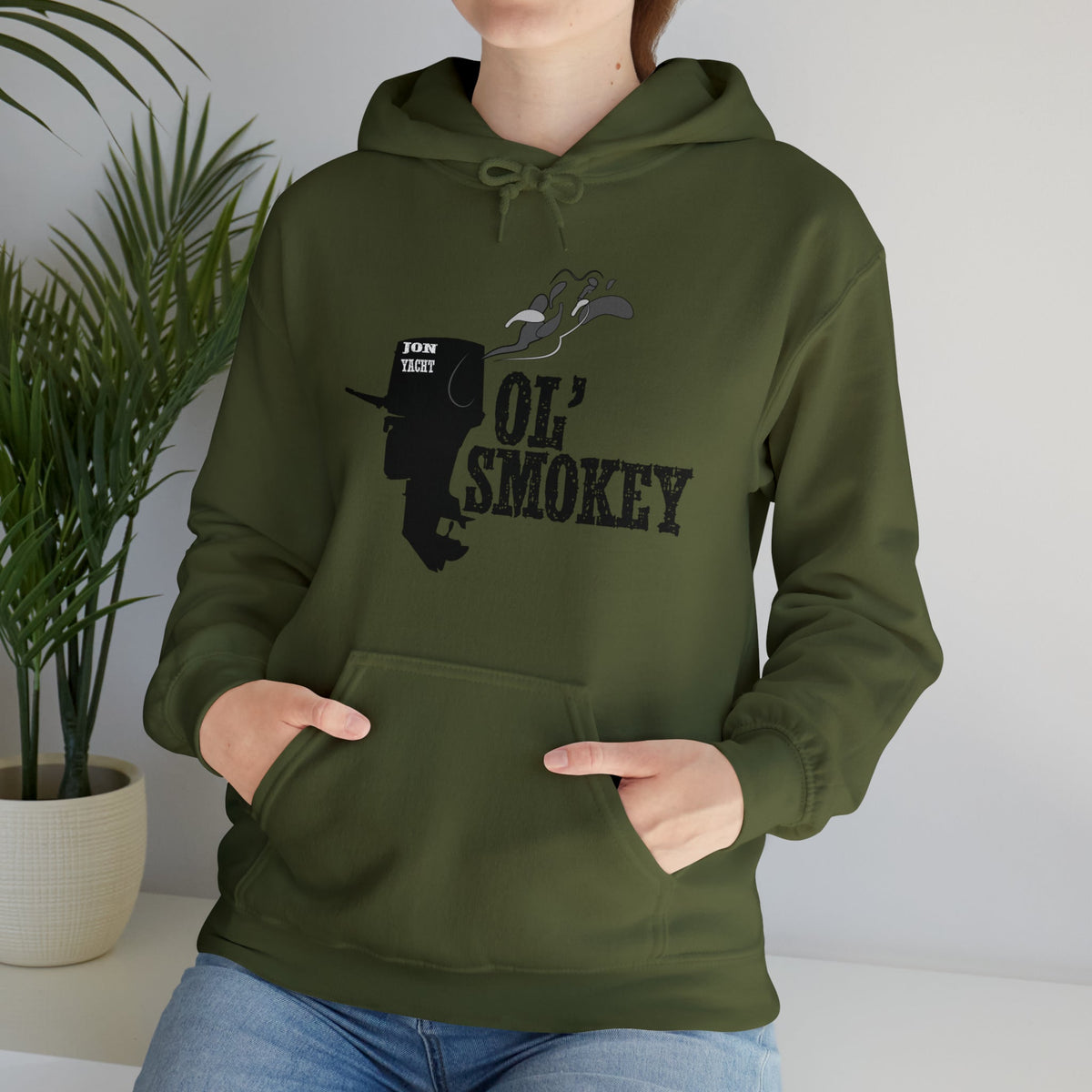 Olive green "Ol' Smokey" hoodie with a black outboard motor graphic and white smoke.