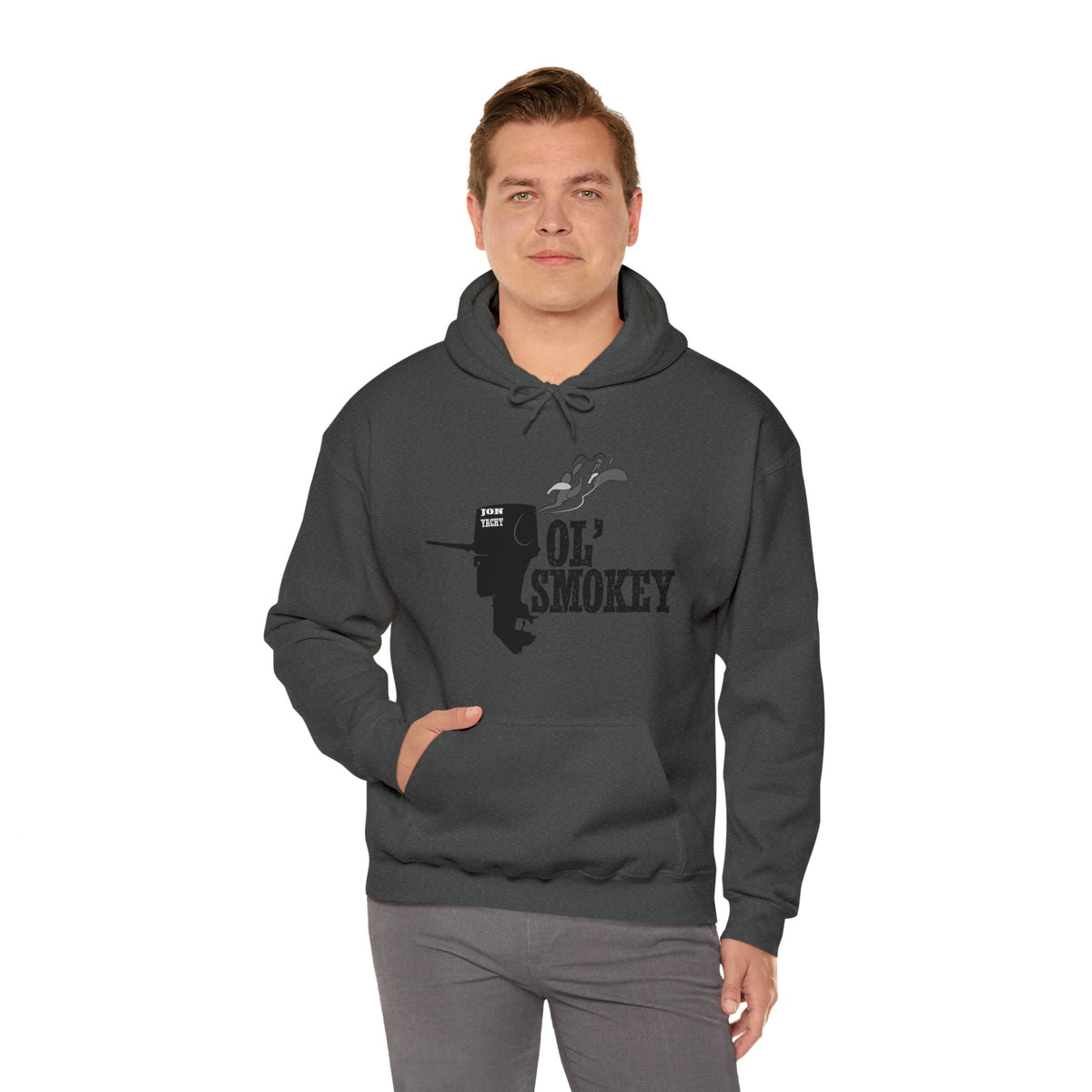 Man wearing a charcoal gray Ol' Smokey Hoodie with a black graphic of a smoking 2-stroke engine.