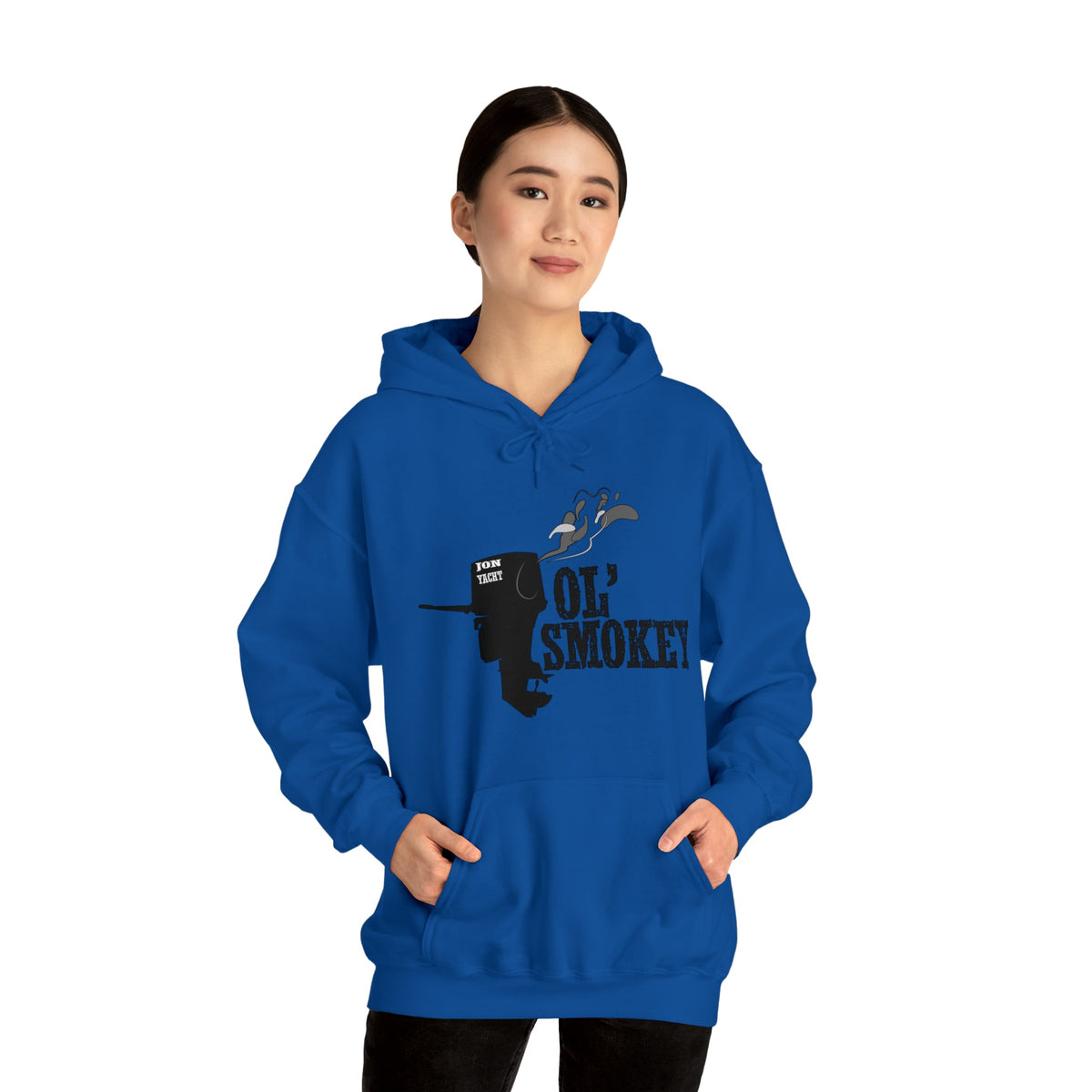 Woman wearing a blue Ol' Smokey Hoodie with a two-stroke engine graphic and front pouch pocket.