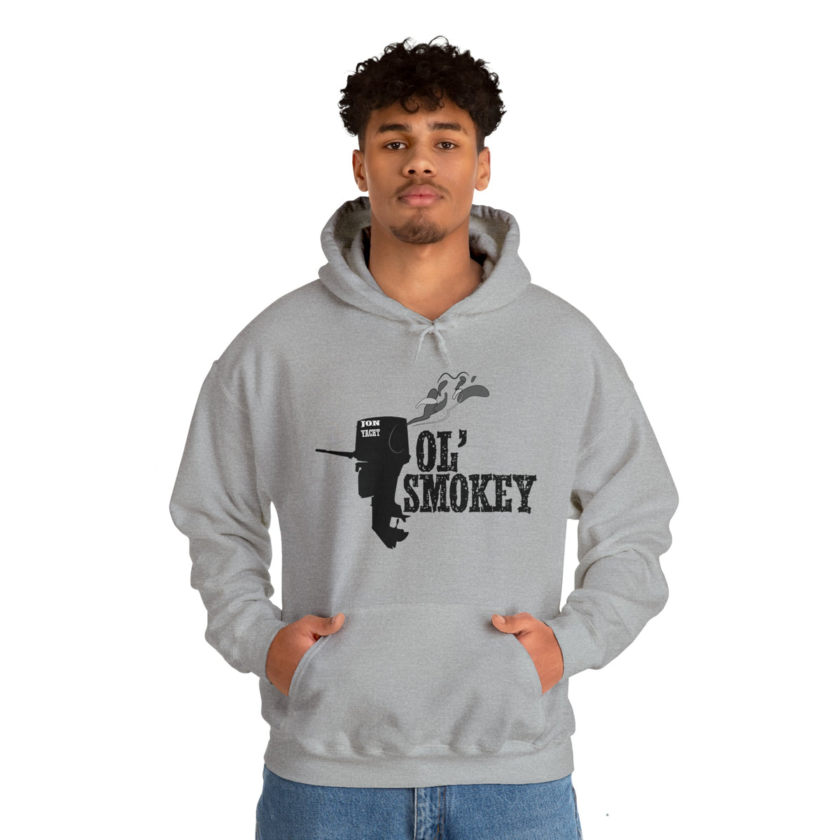 Man in a light grey Ol' Smokey Hoodie with a black two-stroke engine graphic and text.