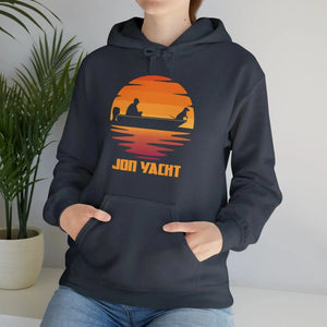 Dark gray hoodie with a vibrant orange and red sunset graphic featuring a person and dog in a boat.