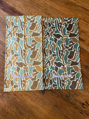 Two Old School Buffs, one light and one dark pluff mud camo, with "JON YACHT" logo.