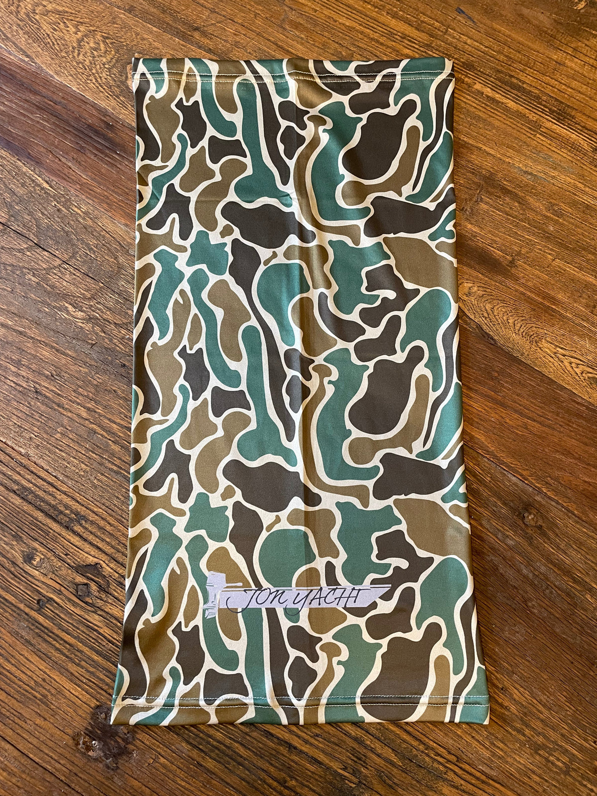 Old School Buff sun buff in dark green, brown, and tan camouflage with "TON YACHT" logo.