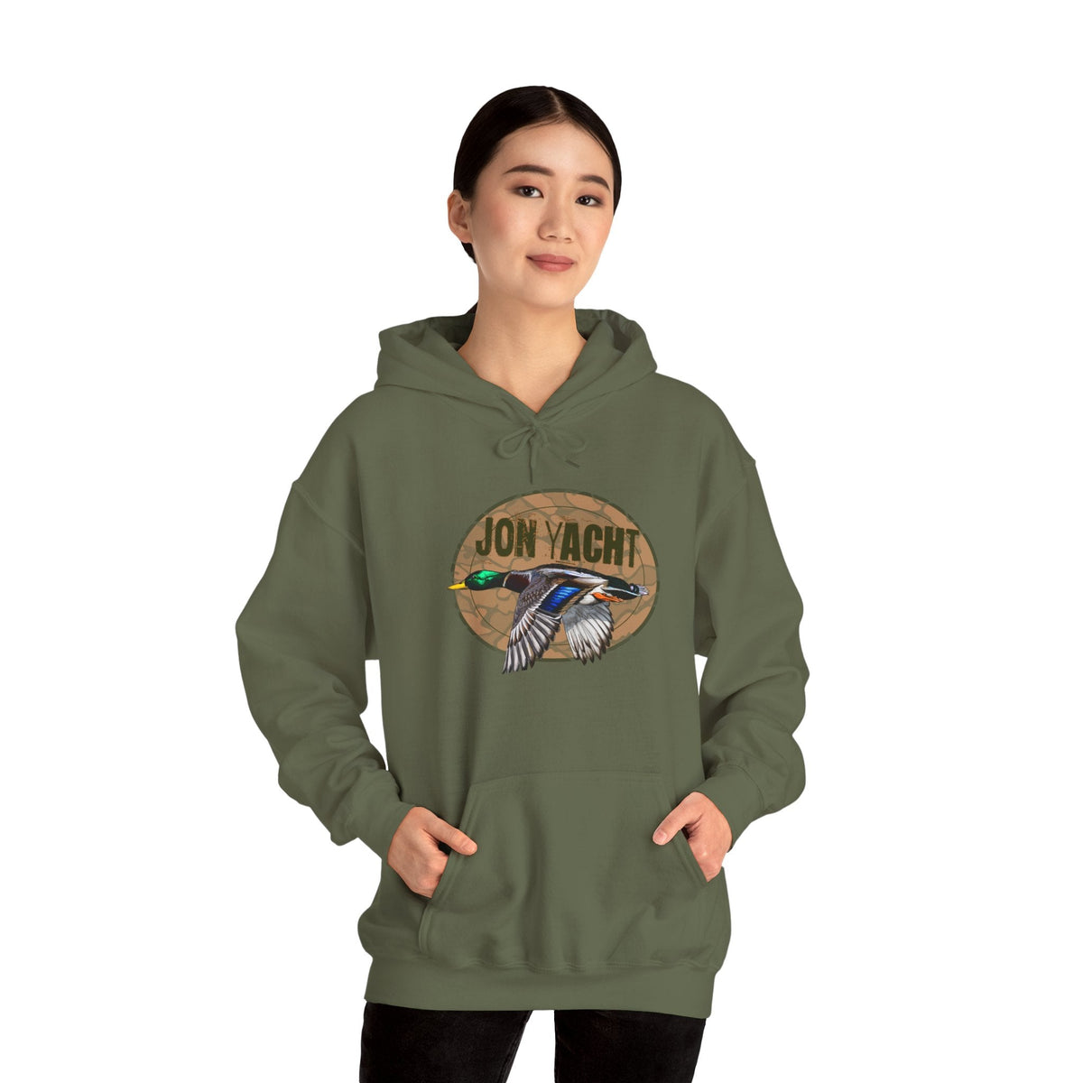 Woman wearing an olive green cotton-polyester hoodie with a flying mallard duck and "JON YACHT" graphic.