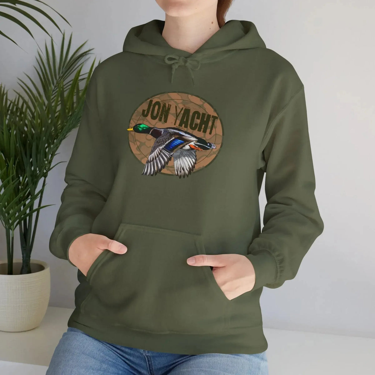 Olive green cotton-polyester hoodie with a "JON YACHT" logo and a flying mallard duck graphic.