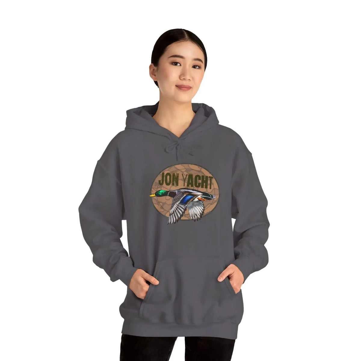Woman wearing a charcoal gray cotton-polyester hoodie with a "JON YACHT" mallard duck graphic.
