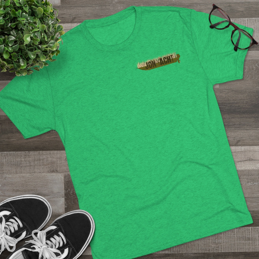 Green tri-blend regular fit tee with "Old School Duck Yacht" chest graphic, styled with glasses and sneakers.