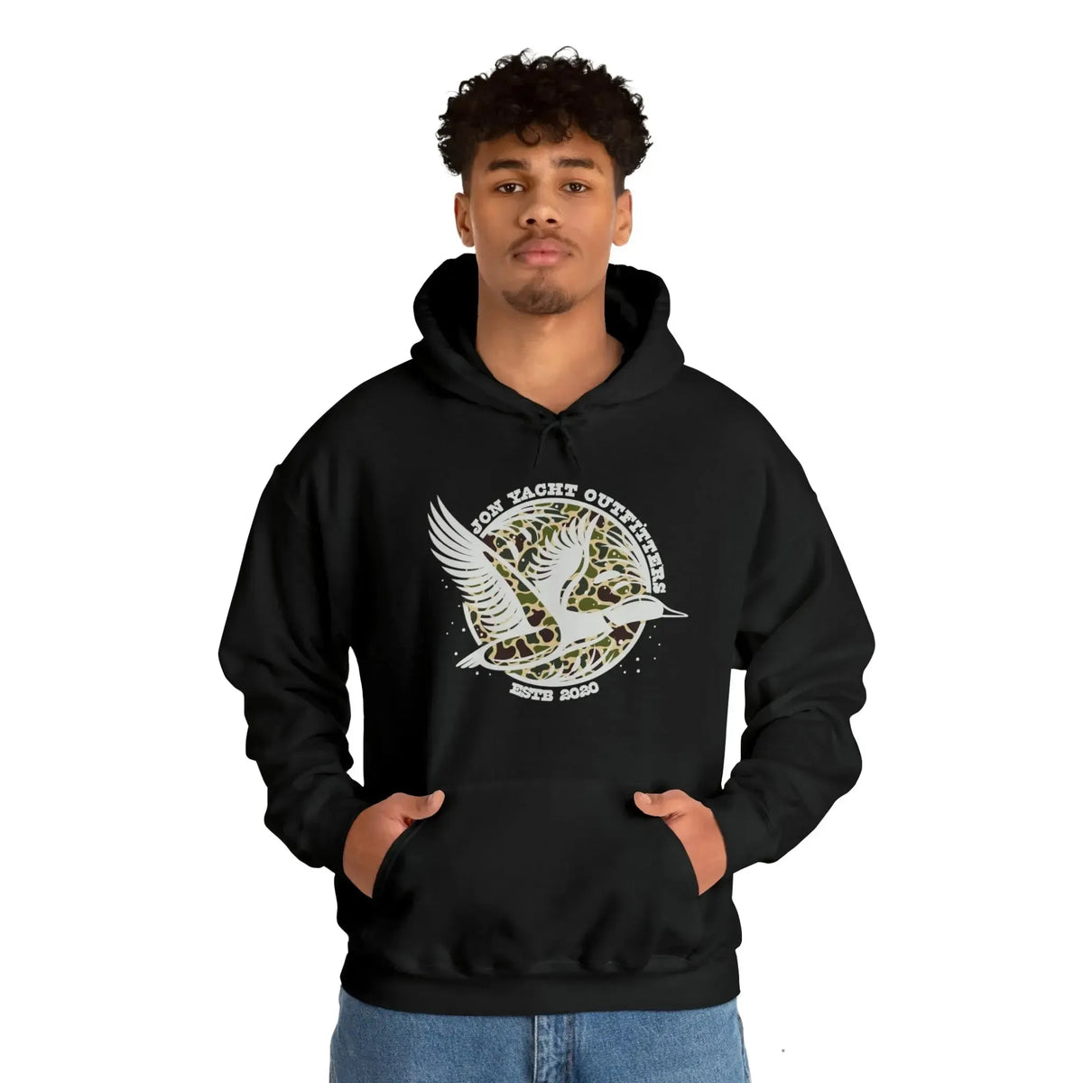 Man in black cotton-polyester hoodie with "Don Yacht Outfitters" duck logo, kangaroo pocket, and matching drawcord.