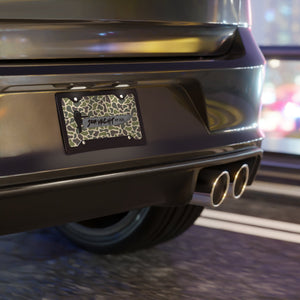 Aluminum Old Skool Plate with camouflage pattern, "SOM YACHT" text, and "NY 2020" on a black car.