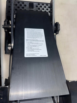 Used black Panther 4-Stroke Bracket with 16" vertical travel, showing adjustment knobs and warning label.