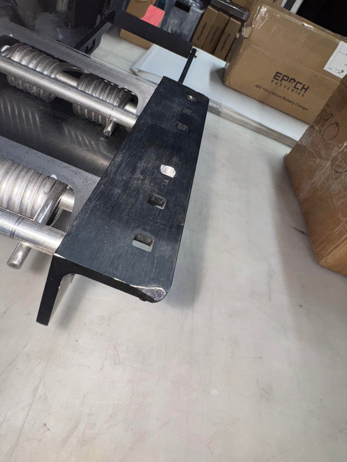 Used black Panther 4-Stroke Bracket with 16" vertical travel, featuring a thick mounting board and stainless steel springs.