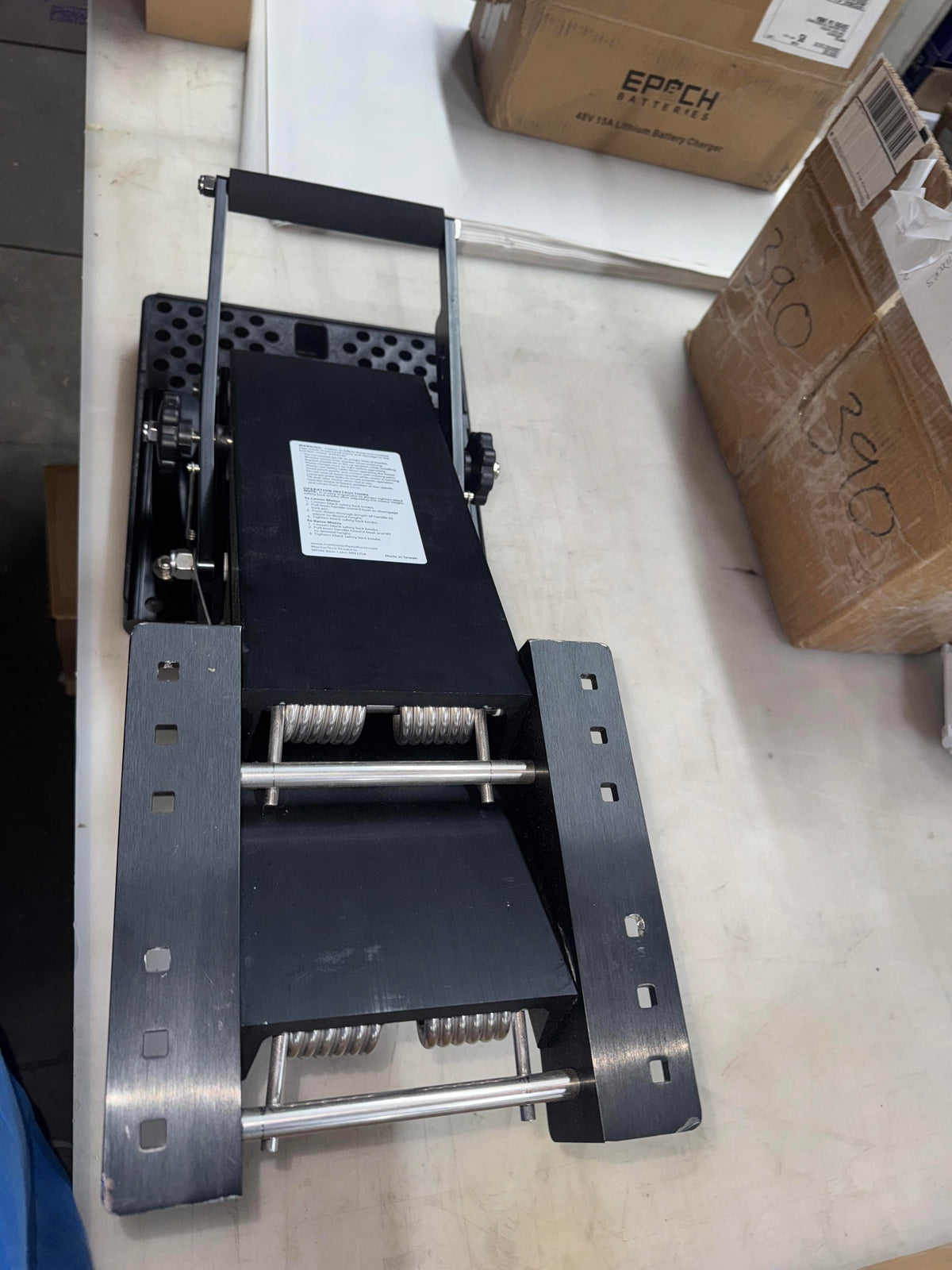 Used black Panther 4-Stroke Bracket with 16" vertical travel, anodized aluminum, and stainless steel hardware.