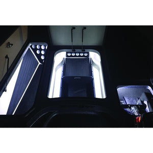 PlashLights Boat Kit with RGB LED channel, strip, and rock lights illuminating a boat interior.