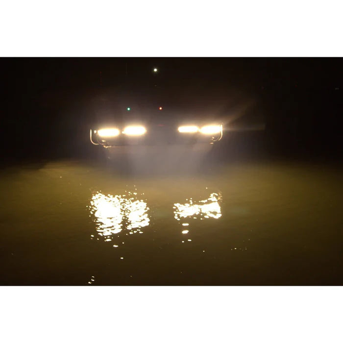 PlashLights Fishing Light Bar illuminating dark water with a warm white glow, mounted on a vehicle.