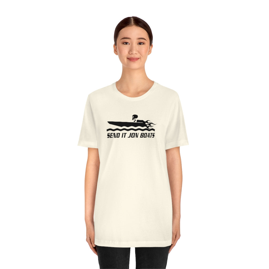 Woman in a cream short sleeve tee with a black "SEND IT JON BOATS" graphic of a speeding boat.