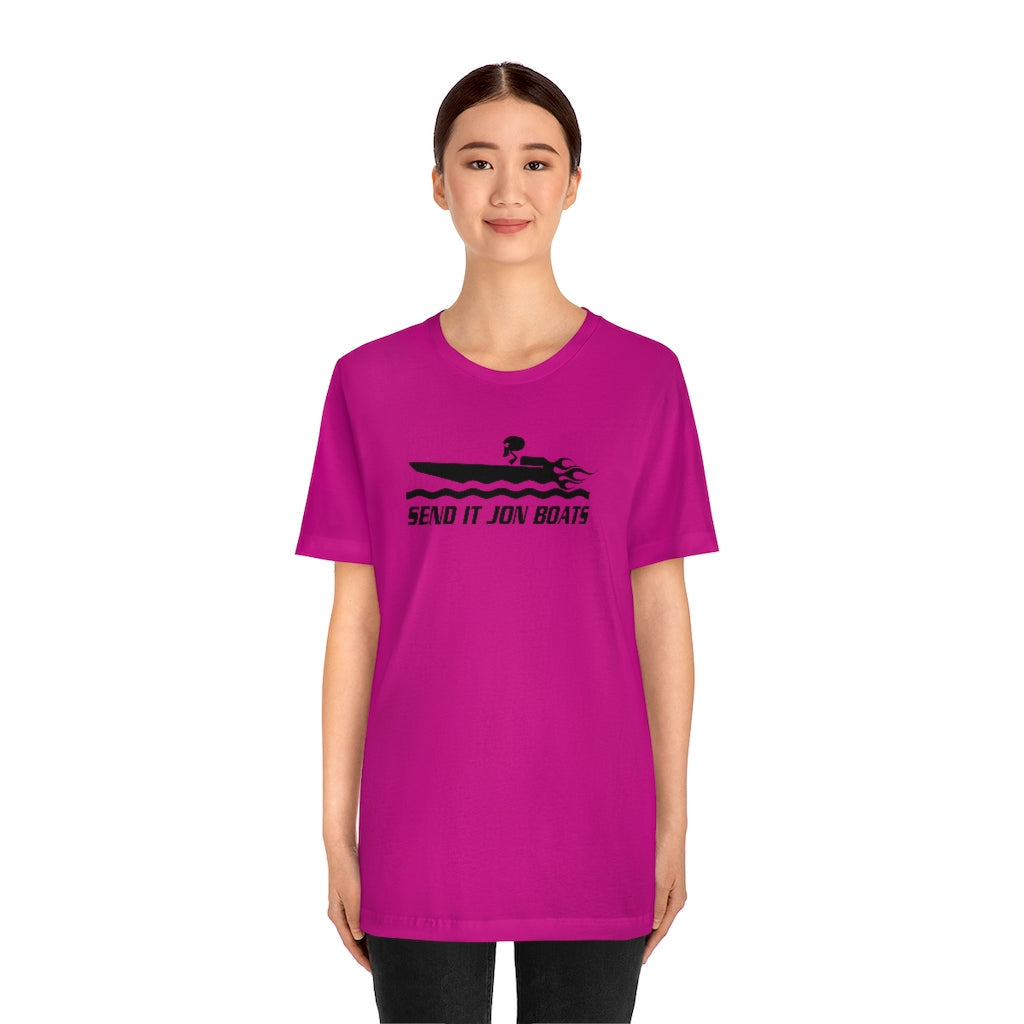 Magenta short sleeve tee with black "SEND IT JON BOATS" text and a skull driving a speed boat graphic.