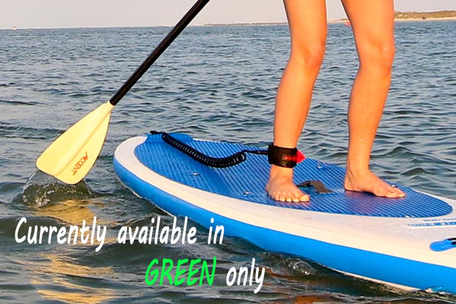 Person on a blue and white SUP with a black coiled leash attached to their ankle, paddling in water.