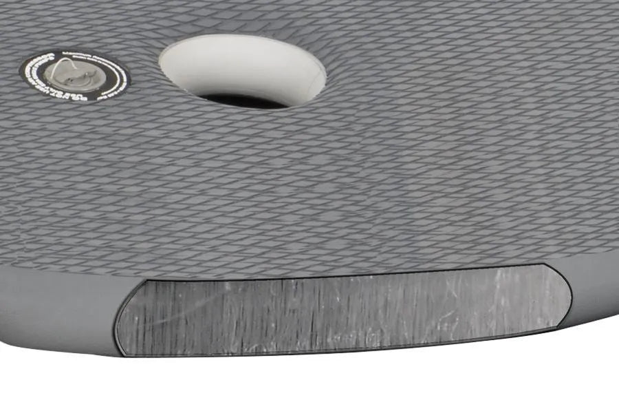 Gray Sea Eagle 10.6sr inflatable drop stitch floor with textured EVA foam pad, inflation valve, and white storage pouch.