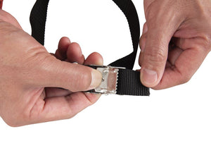 Hands adjusting a black 13' strap with a silver stainless steel buckle.