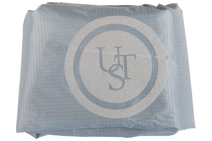 Light blue ripstop nylon dry bag with a reflective circular Sea Eagle logo.