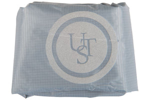 Light blue ripstop nylon dry bag with a reflective circular Sea Eagle logo.