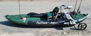 Green and black Sea Eagle 385fta FastTrack Angler inflatable kayak with fishing gear, motor, and cart.