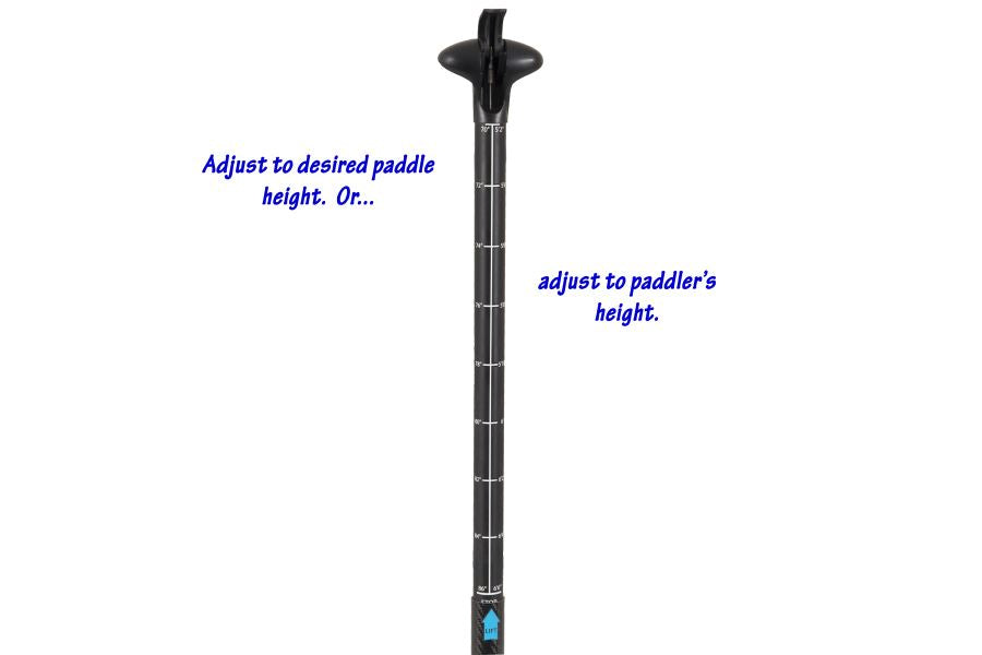 Black carbon fiber SUP paddle with adjustable shaft and ergonomic grip.