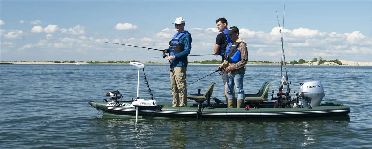 Three men fishing from a green Sea Eagle FishSkiff 16 inflatable boat with a Honda outboard motor.