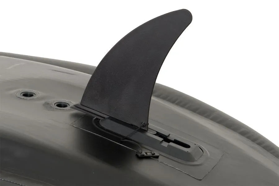 Black 9.5" Sea Eagle large slide-in skeg with a lock-in-place key, attached to a dark inflatable hull.