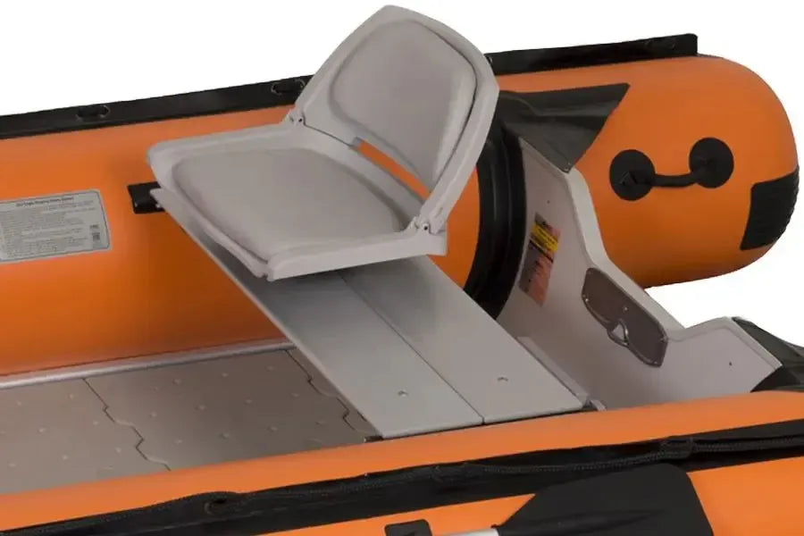 Sea Eagle gray locking swivel seat kit with back support installed in a white and blue inflatable sport runabout.